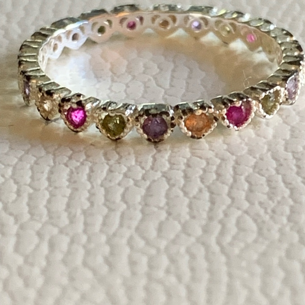 Multi colored stone heart ring in silver setting